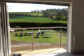 A tailored, balcony overlooking the country side