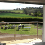 A tailored, balcony overlooking the country side